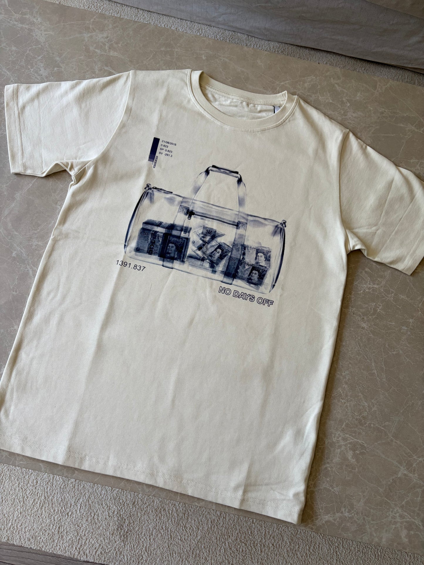 *PRE-ORDER* NDO Duffelbag Tee - OFF White