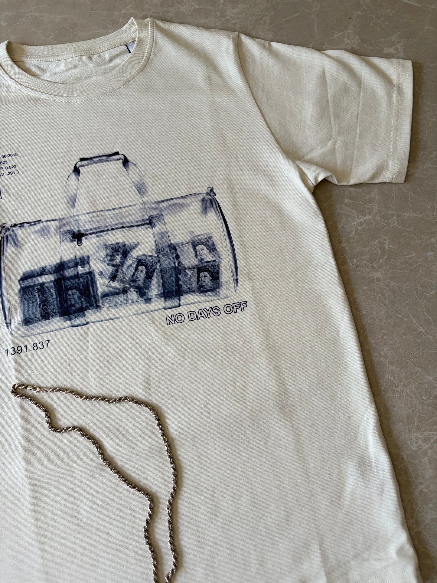 *PRE-ORDER* NDO Duffelbag Tee - OFF White